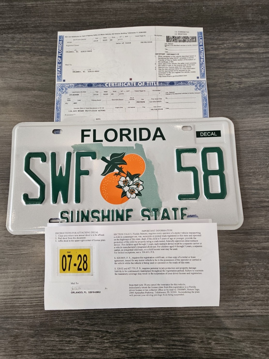 Florida title, vehicle registration and license plate processed by AutoTag FL